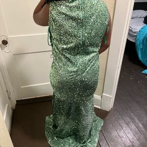 I am selling never worn (not including trying if on) prom dress